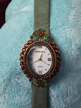 Heidi Daus Jeweled Oval Watch in Green and Amber Accents